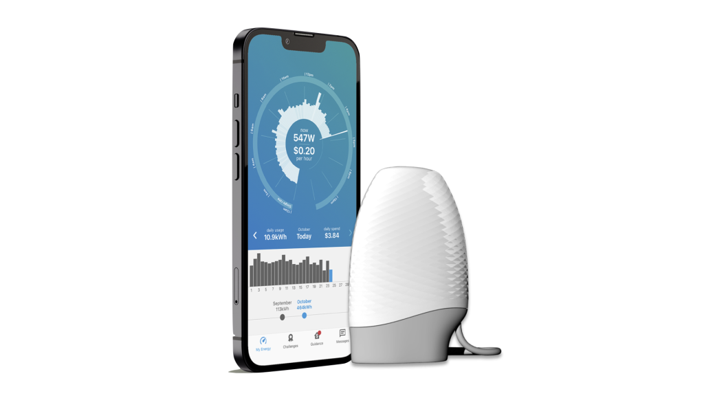 The Powerpal app on a phone next to the Powerpal energy monitor